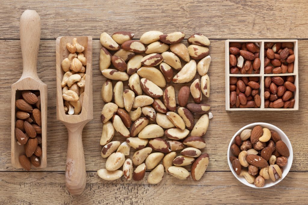 close up view nuts arrangement wooden table